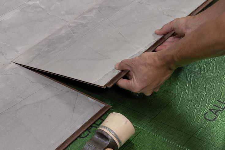 CALI Shorebreak Tiburon Marble 12-mm T x 11-13/16-in W x 23-5/8-in L Waterproof Tile Look Laminate Flooring (15.5-sq ft / Carton) - Image 5