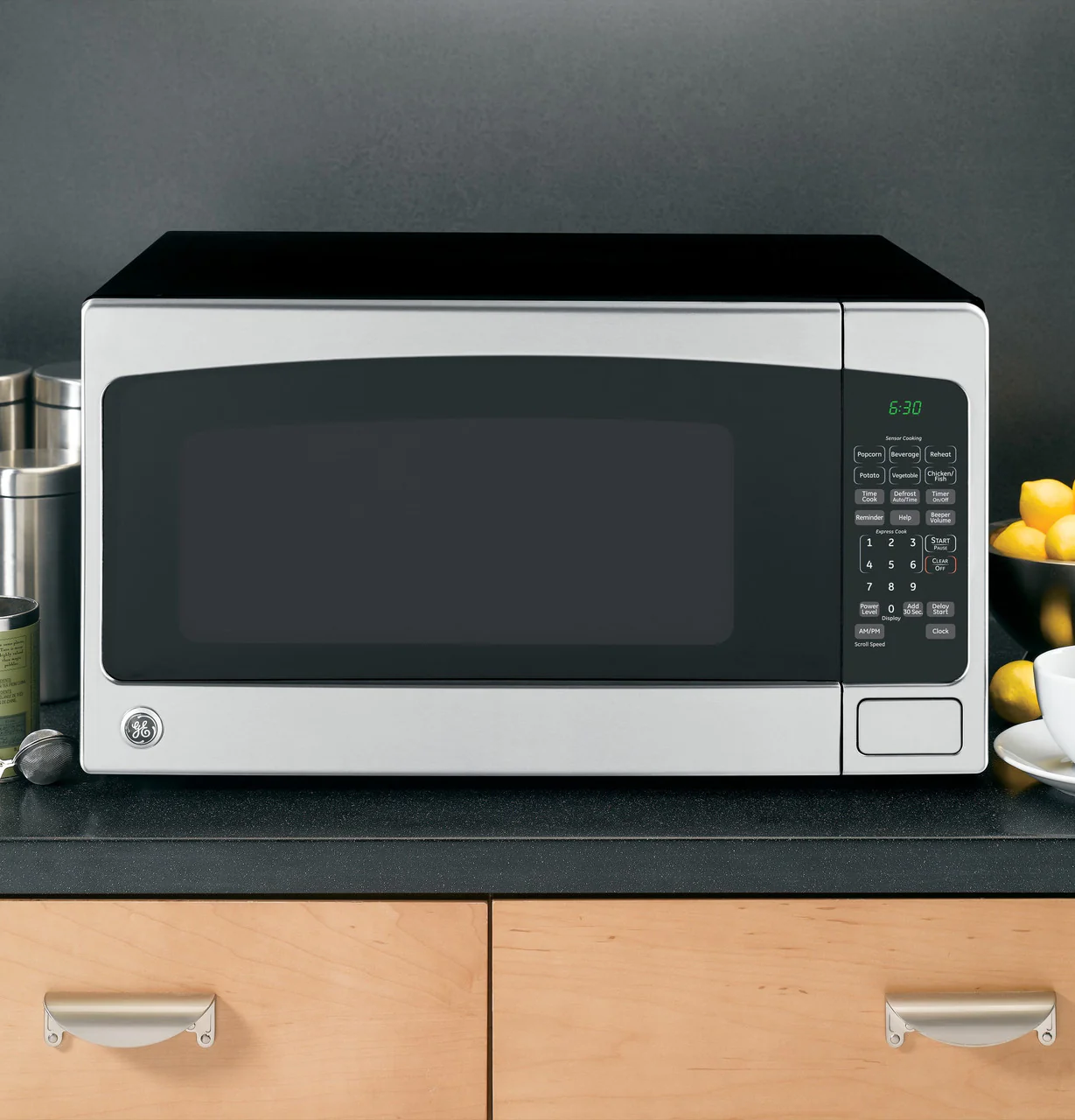GE 2.0-cu ft 1200-Watt Countertop Microwave, Stainless Steel (JES2051SNSS) - Image 3
