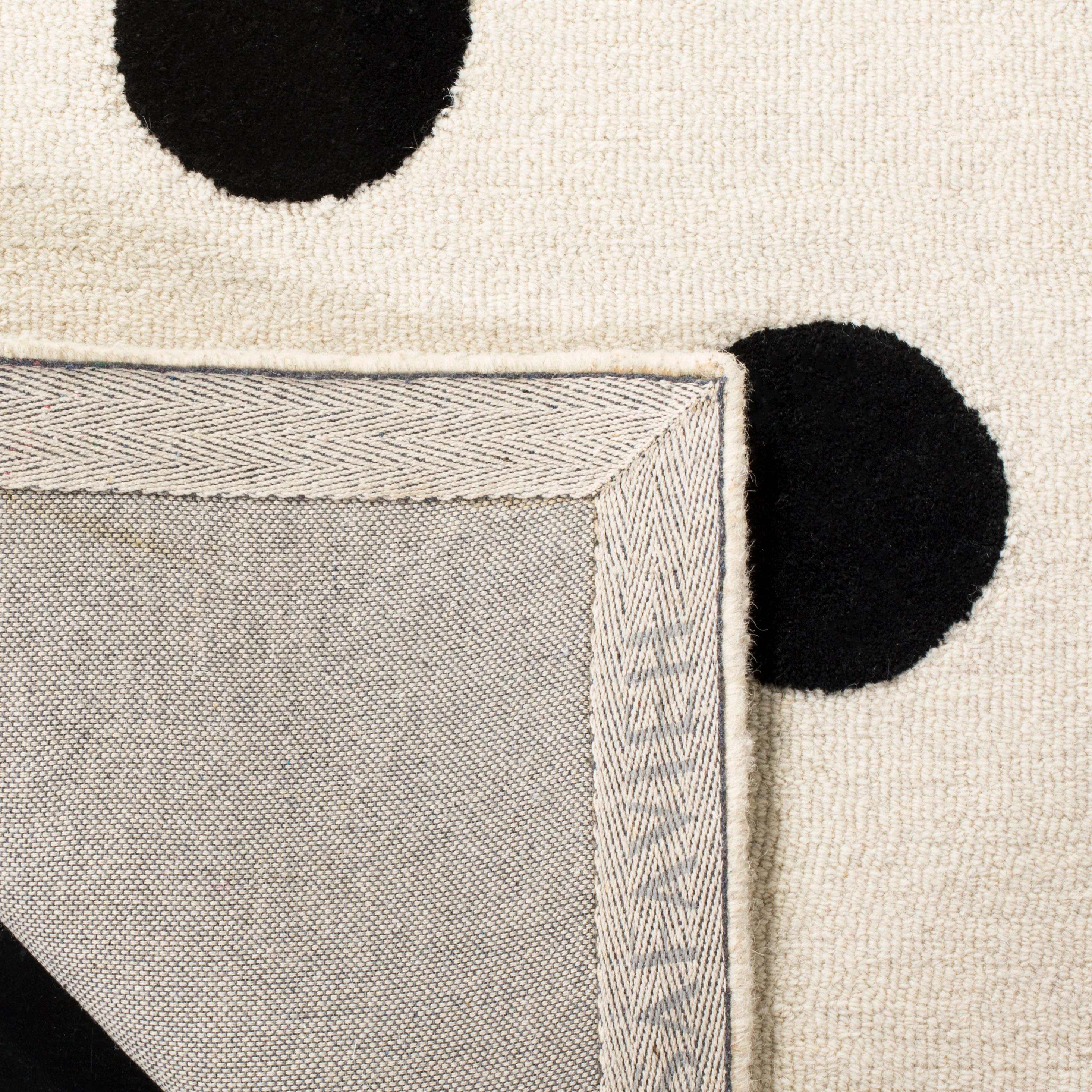 Safavieh Kids Polka Dots 4 x 6 Ivory/Black Handcrafted Wool Indoor Area Rug - Image 4