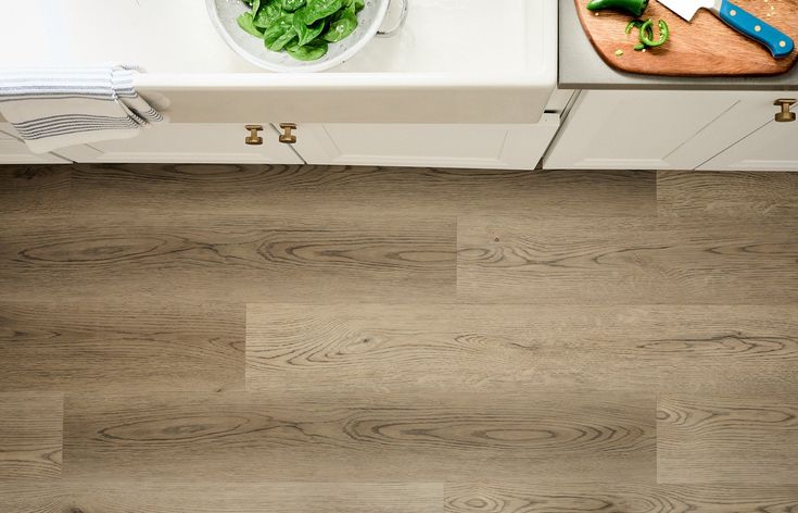 STAINMASTER London Sky Oak 6-mm x 7-in W x 48-in L Waterproof Interlocking Luxury Vinyl Plank Flooring (19.22-sq ft/case) - Image 5